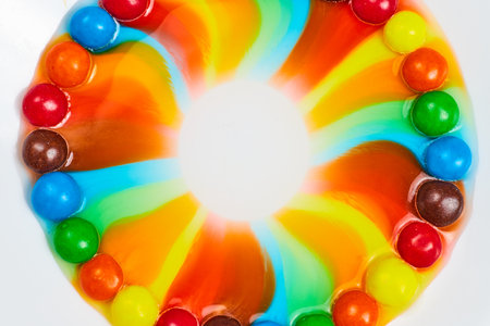 Circular prism of colors from candy skittlesの写真素材