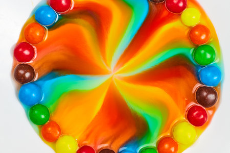 Star burst of color from candy with tie dye centerの写真素材
