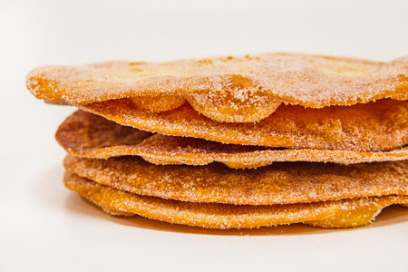 Traditional Christmas BuÃ±uelos on White Background