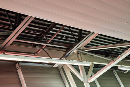 Abstract architecture view of airport ceiling with metal beamsの写真素材