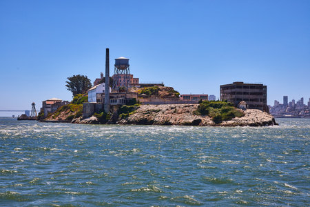 Close view of east side of Alcatraz Island on bright summer day with clear blue skiesの写真素材