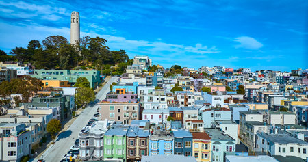 Rows of houses and apartments leading up to Telegraph Hill with Coit Tower aerial