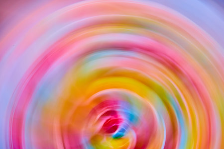 Abstract rainbow flower in circle artistic blurの写真素材