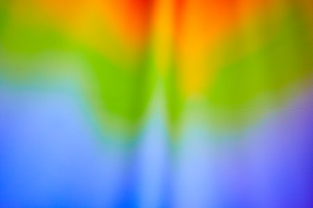 Abstract filtering of light with gentle rainbow colors in background assetの写真素材