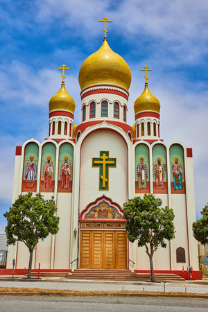 Beautiful blue sky over Holy Virgin Cathedral in San Francisco on cloudy dayの写真素材