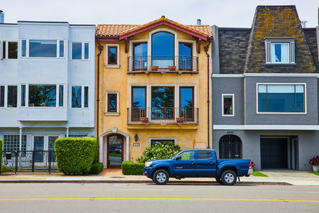 Straight on from street of 3 pastel houses in San Francisco, USAの写真素材