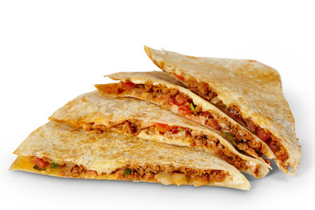 Grilled Quesadilla with Cheese and Meat Filling on White Close-Upの写真素材