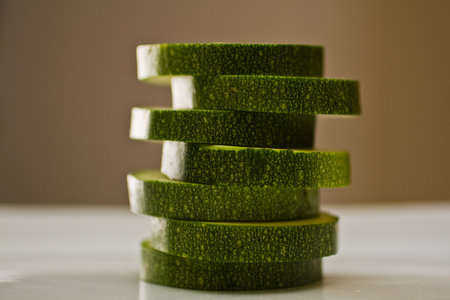 Spiral Arrangement of Fresh Sliced Zucchini Close-upの写真素材