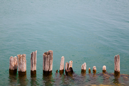 Tranquil Weathered Pier Remnants in Soft Lightの写真素材