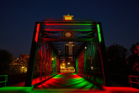 Illuminated Wells Street Bridge with Red and Green Lights in Fort Wayne Nightの写真素材