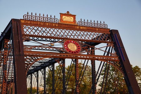 Historic Truss Bridge Ornate Metalwork in Golden Hour Glow, Fort Wayne, Indianaの写真素材