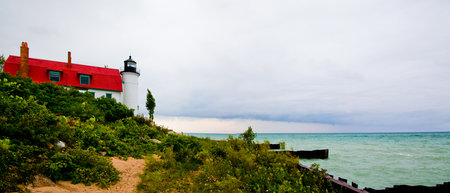 Stormy Michigan Lighthouse Landscape on Lake Michigan Coastの写真素材