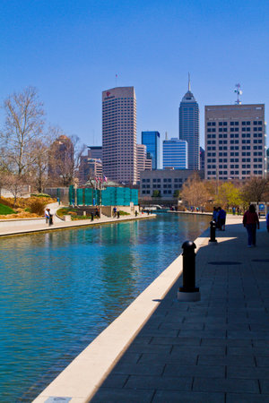 Downtown Indianapolis: Canal Walkway, Skyscrapers, and Daytime Tranquilityの写真素材