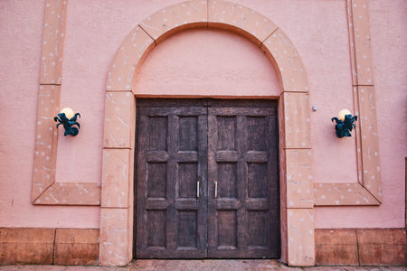 Vintage Wooden Door with Ornamental Lights, Rustic Charmの写真素材