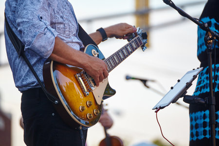Outdoor Electric Guitar Performance in Casual Wear