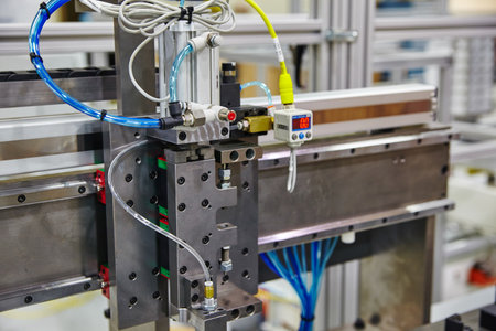 Precision Industrial Machinery Close-Up with Pneumatic Componentsの写真素材