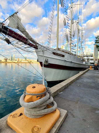 Tall Ship Windy Docked at Chicago Waterfront, Urban Skyline Backgroundの写真素材