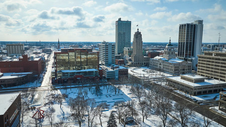 Aerial Winter Cityscape of Fort Wayne with Snow-Covered Buildings