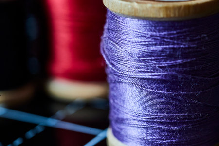 Vibrant Purple Thread Spool Texture with Red Contrast, Macro Side Viewの写真素材