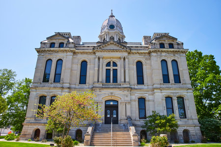 Historic Kosciusko County Courthouse, Warsaw, Indiana - Classic architecture under a clear blue sky.
