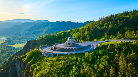 Aerial View of Vista House on Curved Road Amidst Lush Hills