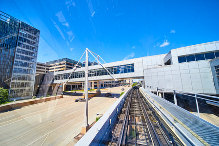 Modern Train Station and Pedestrian Bridge from Track Level