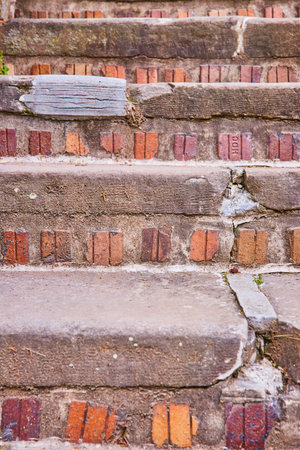 Weathered Brick and Stone Staircase Close-Up with Textured Decay