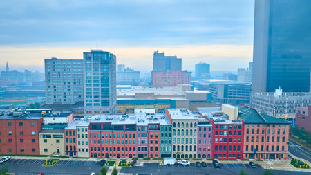 Aerial Sunrise Over Toledo Colorful Row Houses and Modern Skylineの写真素材