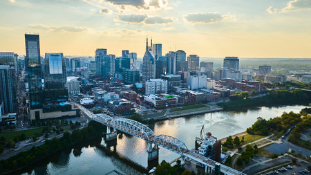 Aerial View of Nashville Skyline and Cumberland River at Sunsetの写真素材
