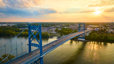 Aerial View of Suspension Bridge at Golden Hourの写真素材