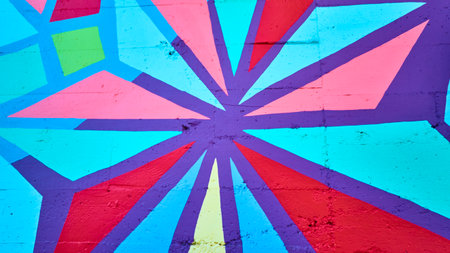 Vibrant Geometric Mural with Starburst Motion at Eye-Levelの写真素材