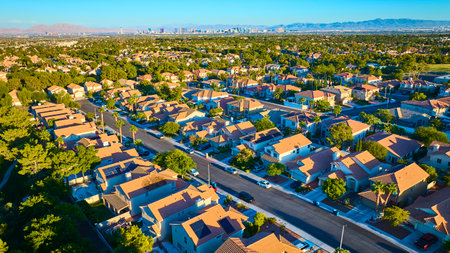 Aerial Suburban Las Vegas with Desert and Skyline at Sunsetの写真素材