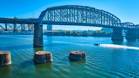 Aerial of Cincinnati Purple People Bridge and Speedboat Motionの写真素材