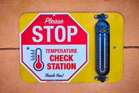 Temperature Check Station Sign with Thermometer Eye-Level Viewの写真素材