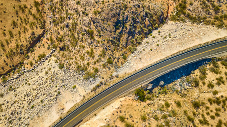 Aerial of Winding Desert Road Across Gooseberry Mesa, Utah