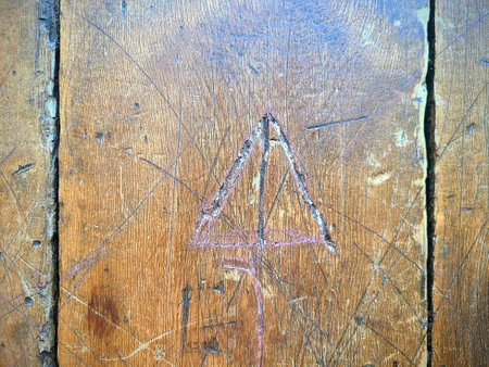 Rustic Hand-Carved Geometric Wood Texture Close-Up