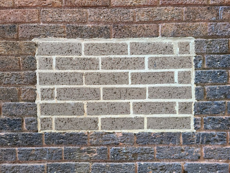 Urban Brick Wall Repair Detail with Eye-Level Perspective