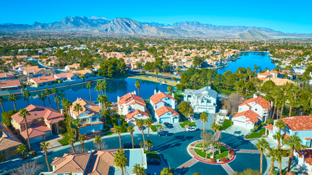 Aerial of Suburban Las Vegas Oasis with Red Roofs and Palm Treesの写真素材