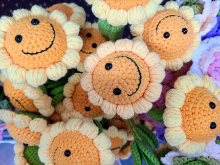 Crochet Sunflowers with Smiling Faces Eye-Level Viewの写真素材