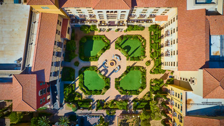 Aerial Mediterranean Courtyard with Geometric Garden and Fire Pit Top Down Viewの写真素材