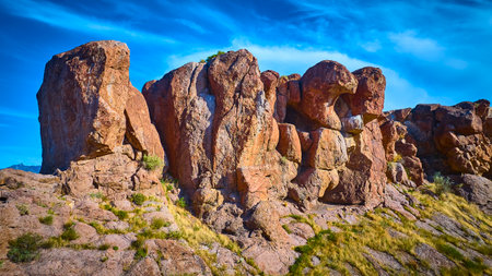 Aerial Fly Through Rugged Desert Rock Formations and Blue Sky Southwest
