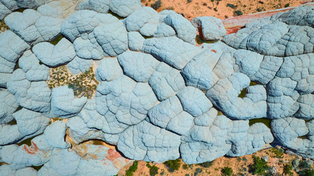 Aerial White Sandstone Formations and Desert Vegetation Top Down Viewの写真素材