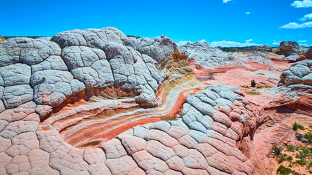 Aerial White Pocket Sandstone Domes and Swirling Layers Motion Viewの写真素材