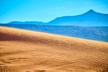 Sand Dune Ripples and Mountain Range with Upward Low Angle Perspectiveの写真素材