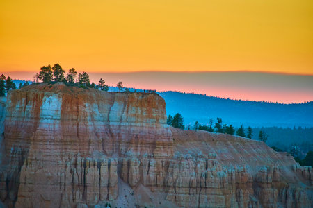 Bryce Point Hoodoos and Pines at Sunset in Bryce Canyon National Parkの写真素材
