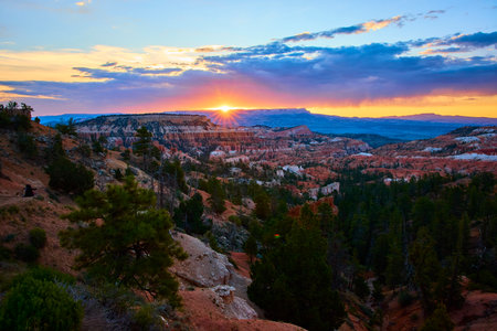 Sunrise Over Hoodoos and Pine Trees at Bryce Canyon National Park Golden Hourの写真素材