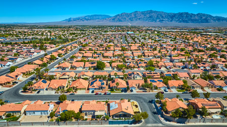 Aerial Residential Suburb Las Vegas Nevada with Desert Mountain Backgroundの写真素材