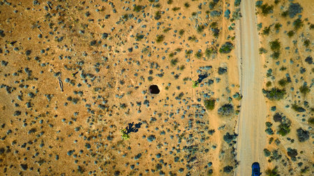 Aerial Devils Nostril Desert Feature and Dirt Road in Nevadaの写真素材
