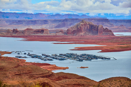 Lake Powell Marina with Houseboats and Red Rock Formations Aerialの写真素材