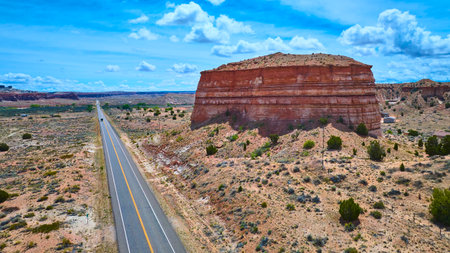 Aerial Desert Highway and Red Mesa in Canyon Point Utahの写真素材